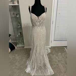 Beaded allure fit, and flare bridal gown